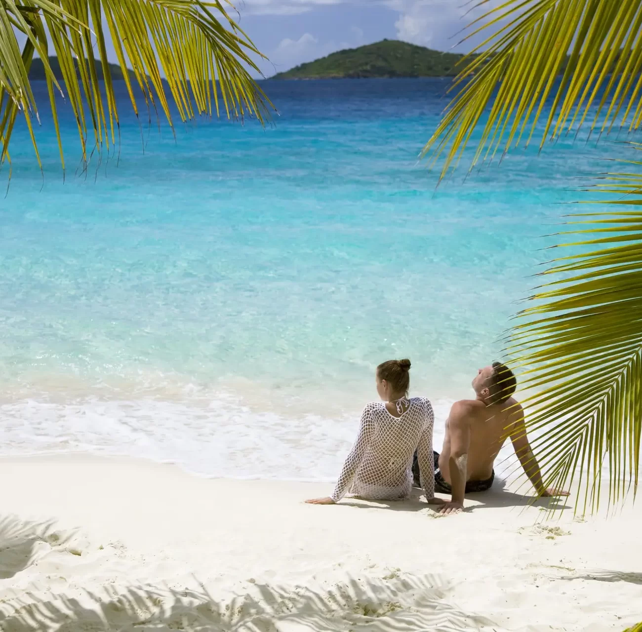 Couple relaxing on a tropical beach