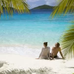Couple relaxing on a tropical beach
