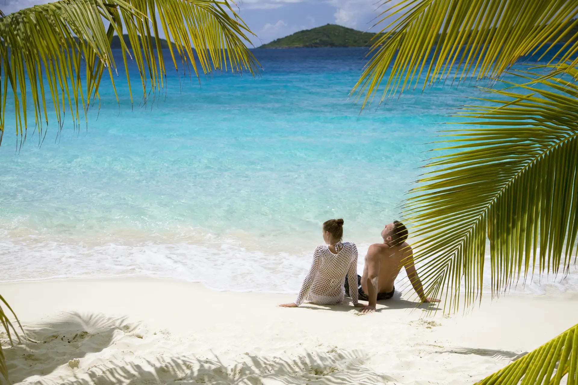 Couple relaxing on a tropical beach